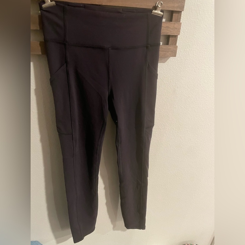 Lululemon women's Invigorate High Rise‎ tight Legging Black media pockets size 4